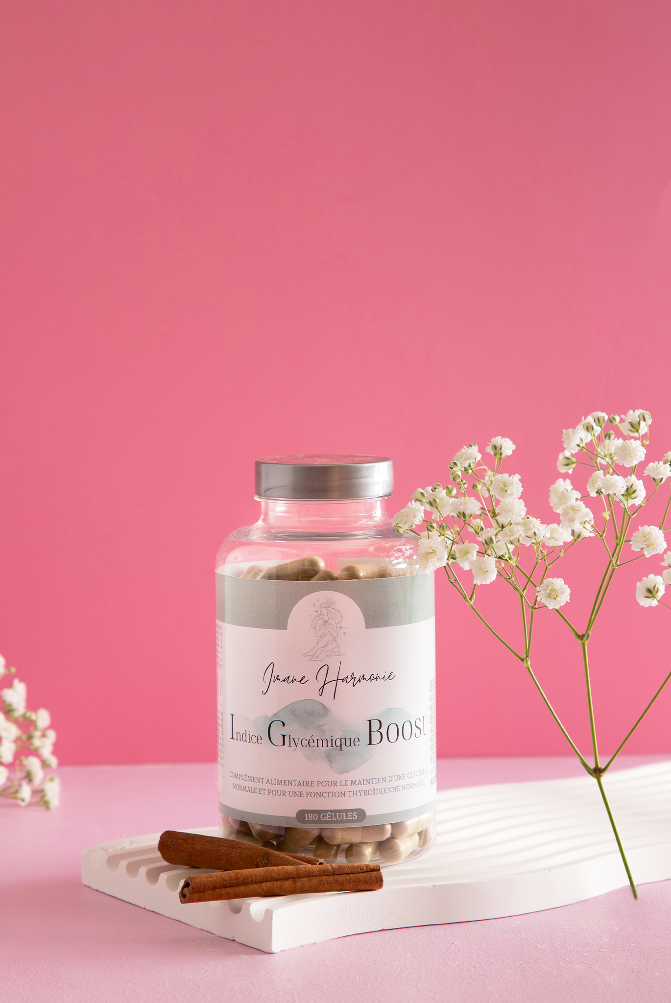 Glycemic index boost supplement with a pink background
